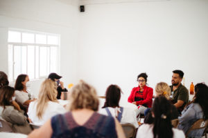 A group of people meet in a room